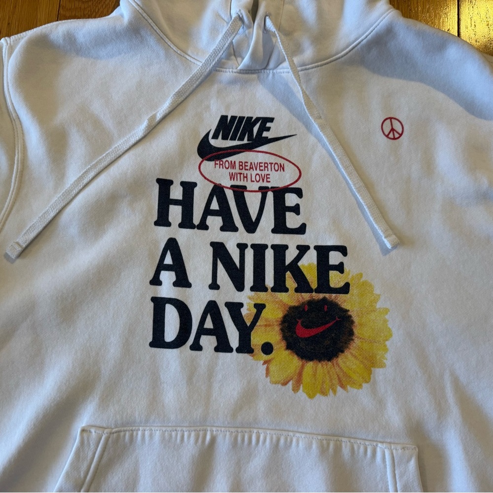 Nike “Have A Nike Day” white pullover hoodie.